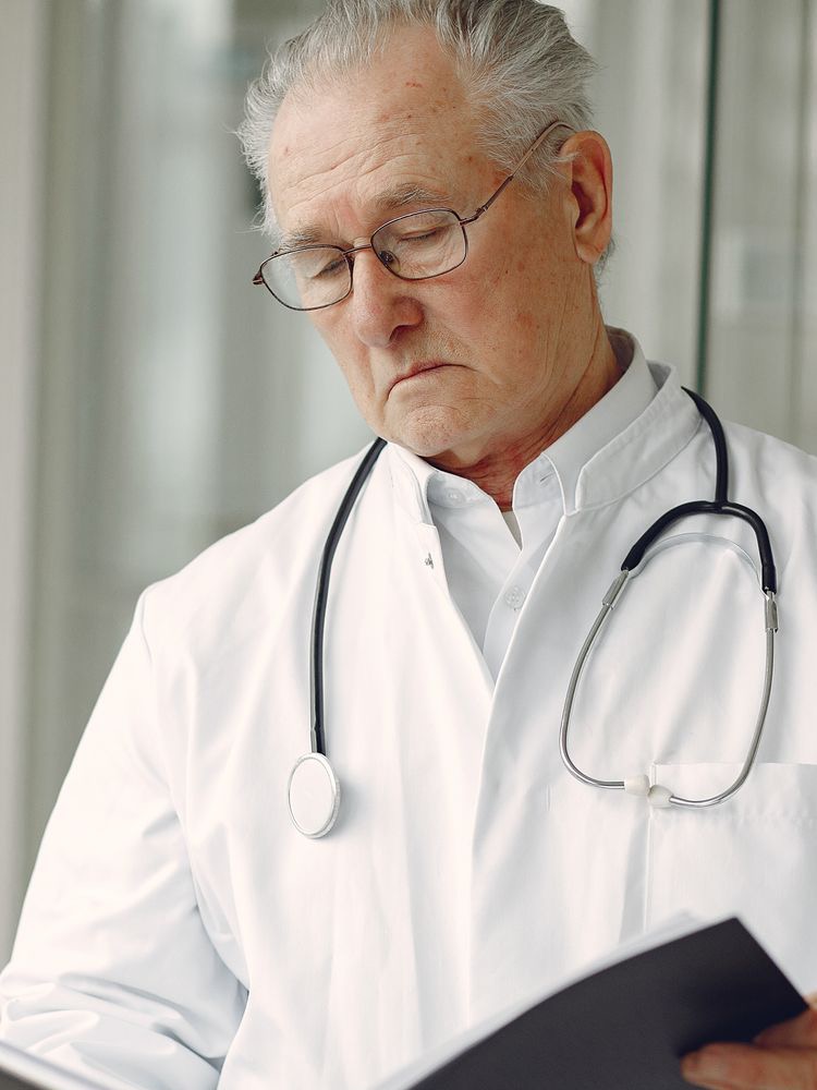 Independent physician reviewing a patient chart