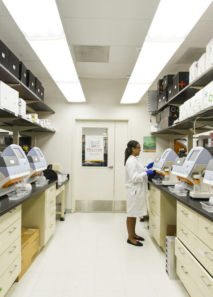 Laboratory scientist working with clinical analyzers