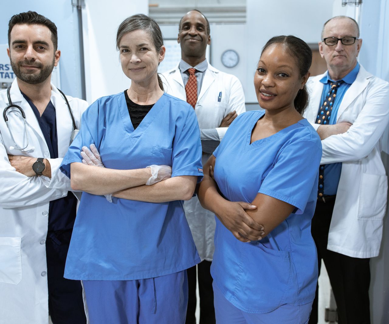 Multi-provider clinical team standing together